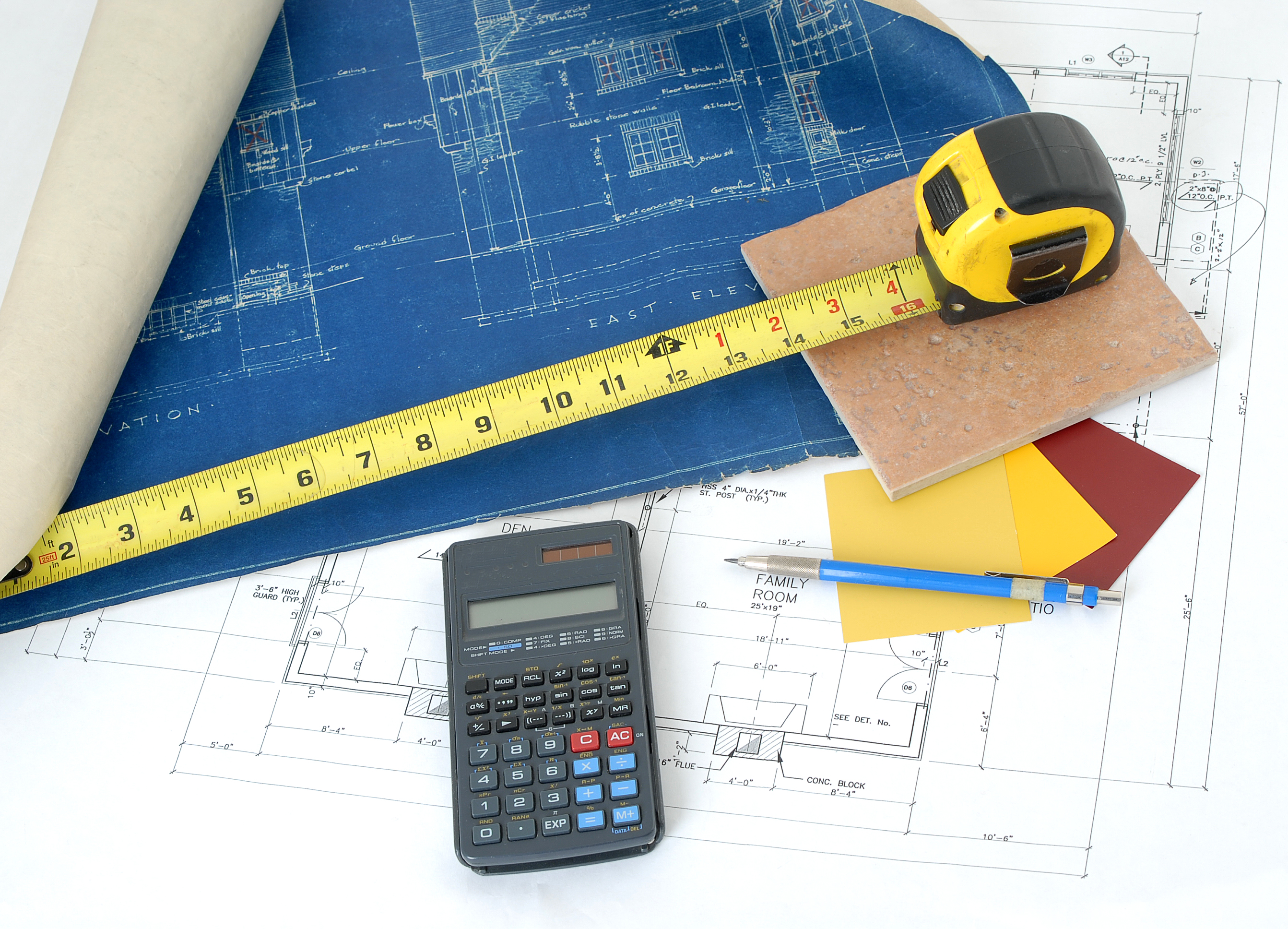 Estimator working on cost analysis for a construction project